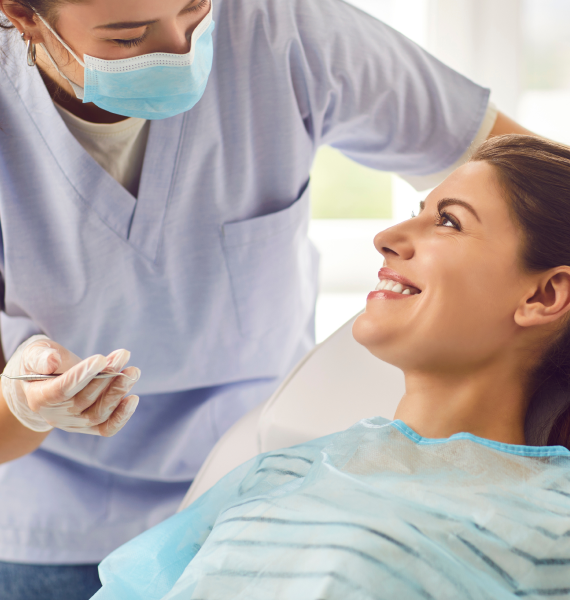 Smiling woman outside with healthy teeth
